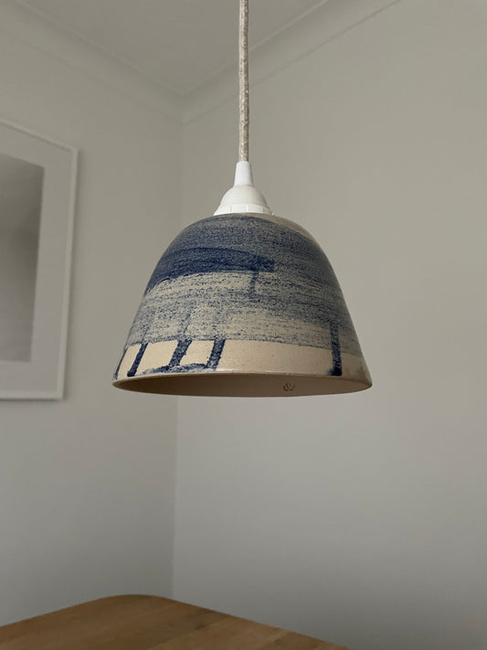 Hand-thrown ceramic lampshade with cobalt wash inky blue glaze, designed for pendant light fittings